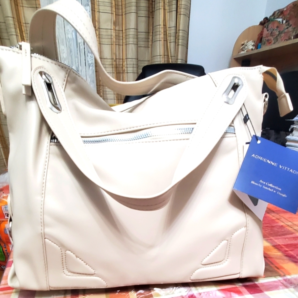 NWT Adrienne Vittadini Ava Collections Beautiful Cream Colored Satchel. $60.